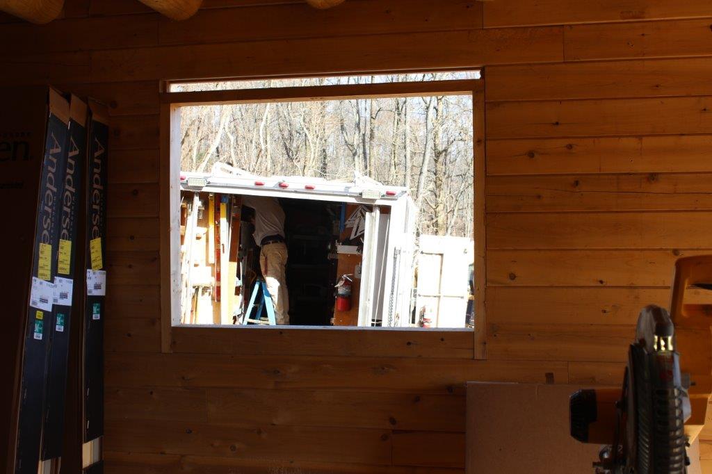 Here's a view of the window buck in the kitchen area.  The gap above the window will be insulated and flashing installed into the kerf that was cut in the log that serves as the header.