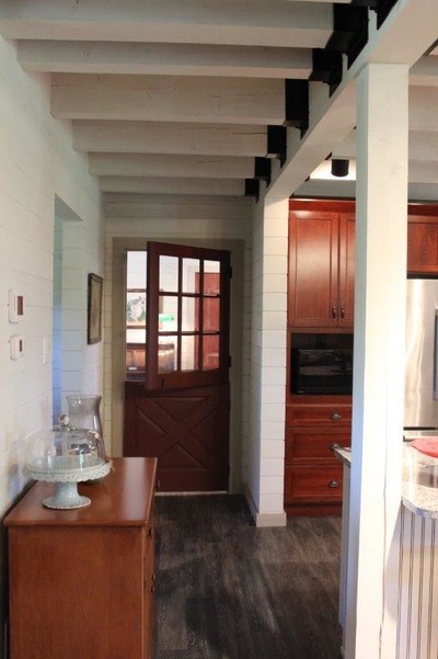 A Dutch door between the kitchen and mudroom.